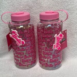 Get 2 NWT Barbie Pink 32 oz reusable water bottles. Includes Malibu Key Chains